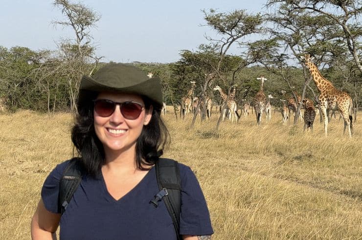 Rock My Adventure group watching a giraffe in Lake Mburo National Park, Uganda