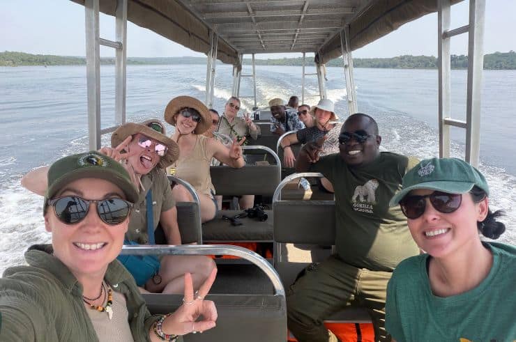 Rock My Adventure group watching a giraffe in Lake Mburo National Park, Uganda