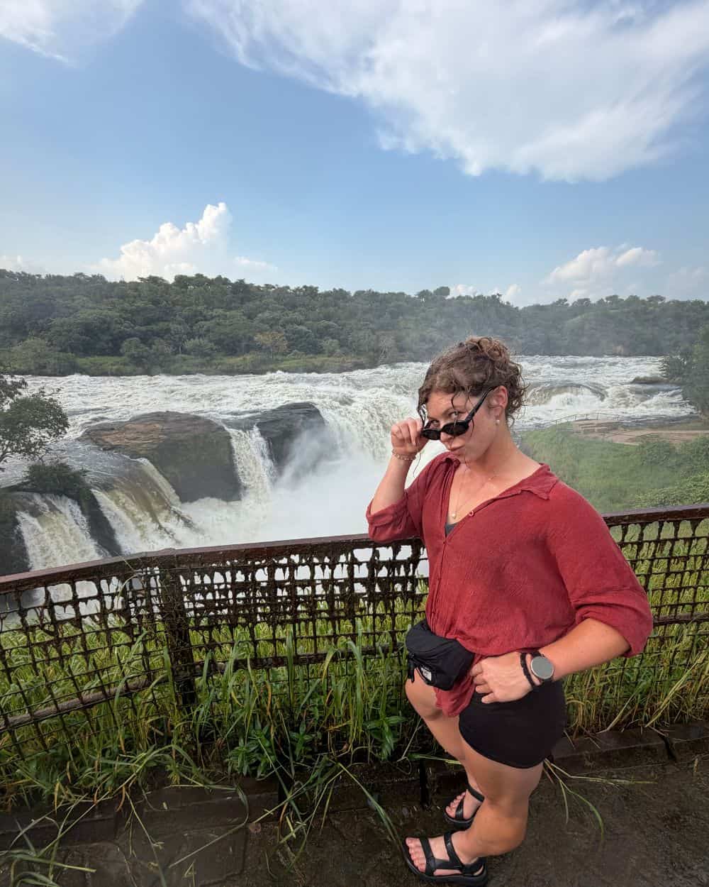 Rock My Adventure group watching a giraffe in Lake Mburo National Park, Uganda